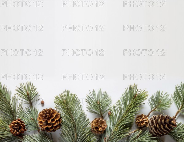Holiday-themed flat lay with evergreen pine branches and pine cones, evoking a minimalist and festive atmosphere, perfect for winter and seasonal designs, greeting cards, or decorating ideas, AI generated