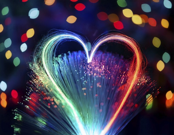 Colorful artistic display featuring vibrant light patterns shaped like a heart, expressing love and creativity through illuminated fibers in a mesmerizing spectrum of rainbow hues, AI generated