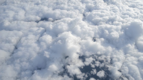 Aerial view on white fluffy clouds. View of the clouds from above, AI generated