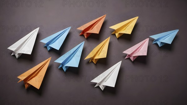 Colorful paper planes arranged in organized pattern, symbolizing creativity, playfulness, imagination, and artistic decorative concepts, AI generated