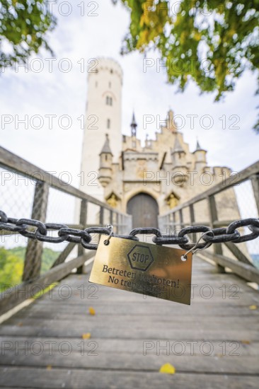 Locked chain on a bridge with a view of a castle gate, Lichtenstein Castle, Lichtenstein, Swabian Alb, Germany