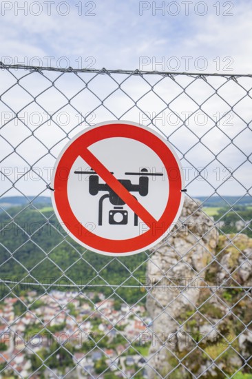 Sign on the fence indicating a drone ban, with a view of the landscape below, Lichtenstein Castle, Lichtenstein, Swabian Alb, Germany