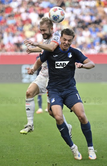 Header duel duel action Fisnik Asllani TSG 1899 Hoffenheim (11) against Konrad Laimer FC Bayern Munich FCB (27) Bundesliga, PreZero Arena, Sinsheim, Baden-Württemberg, Germany
