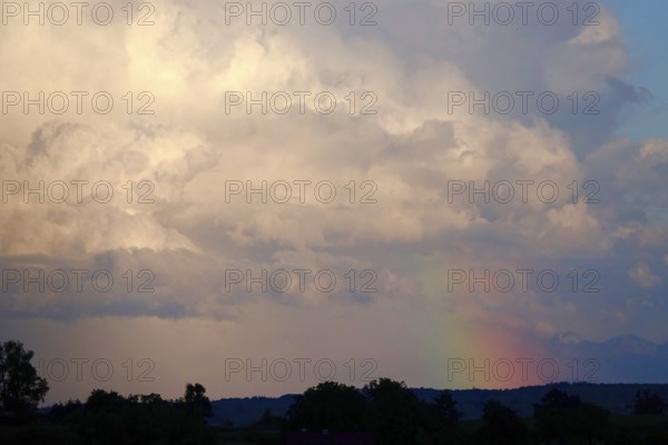 Cloudy sky, rainbow, summer, Germany