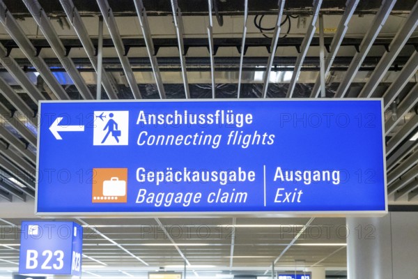 Sign at Frankfurt Airport with the inscription Connecting flights and baggage claim, Frankfurt, Germany