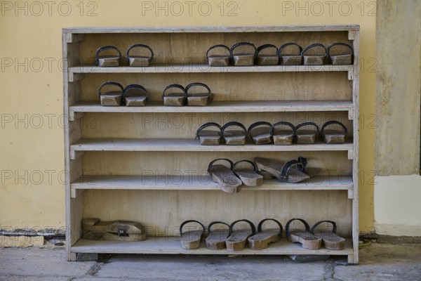 Wooden shelf with traditional sandals in the mosque, Ibrahim Pasha Mosque, Old Town, Turkish Quarter, Rhodes Town, Rhodes, Dodecanese, Greek Islands, Greece