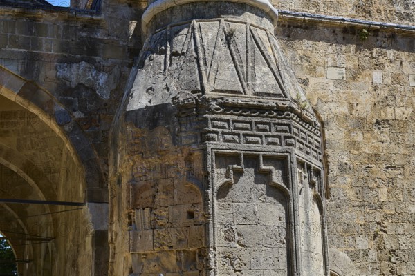 Historic masonry with detailed relief elements and play of the sun on the surface, Recep Pasha Mosque, Old Town, Turkish Quarter, Rhodes Town, Rhodes, Dodecanese, Greek Islands, Greece