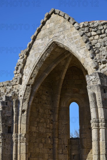 Church of Virgin Mary of the Castle, detailed view of a Gothic ruin with a striking window under a blue sky, Rhodes Old Town, Rhodes Town, Rhodes, Dodecanese, Greek Islands, Greece
