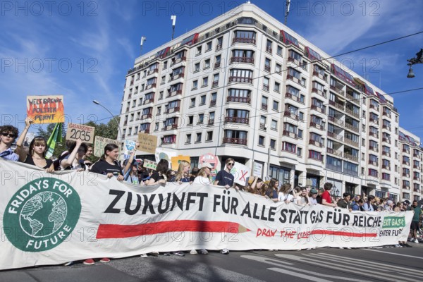 Demonstrators with front banner Future for all instead of gas for the rich on Friedrichstraße at the demonstration on climate protection organised together with Fridays for Future, Berlin, 20.09.2025