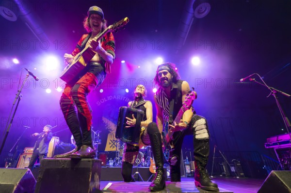 Eugene Hütz, left, singer and guitarist, Gogol Bordello, folk-punk band, USA, live on Fall 2025 European Tour at Huxleys Neue Welt in Berlin on 19 September 2025 < english> Eugene Hütz, singer and guitarist, folk-punk band, live on Fall 2025 European Tour at Huxleys Neue Welt in Berlin on September 19, 2025