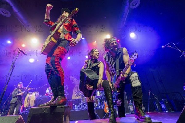 Eugene Hütz, left, singer and guitarist, Gogol Bordello, folk-punk band, USA, live on Fall 2025 European Tour at Huxleys Neue Welt in Berlin on 19 September 2025 < english> Eugene Hütz, singer and guitarist, folk-punk band, live on Fall 2025 European Tour at Huxleys Neue Welt in Berlin on September 19, 2025
