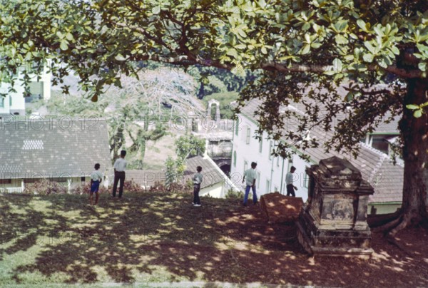 View from above over Porta de Santiago, historic Portuguese gateway of A Famosa fortress, Malacca or Melaka, Malaya, Malaysia, south east Asia 1964