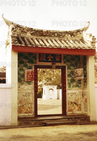 Gateway to Chinese Taoist temple dedicated to Tua Pek Kong, Poh San Teng Temple, Malacca or Melaka, Malaya, Malaysia, south east Asia 1964