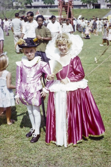 Garden fete community event in the grounds of HMS Terror naval base, Sembawang, Singapore, South East Asia, 1963 - British children in fancy dress clothing