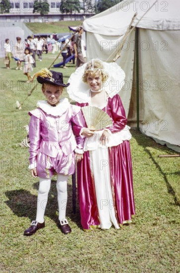Garden fete community event in the grounds of HMS Terror naval base, Sembawang, Singapore, South East Asia, 1963 - British children in fancy dress clothing