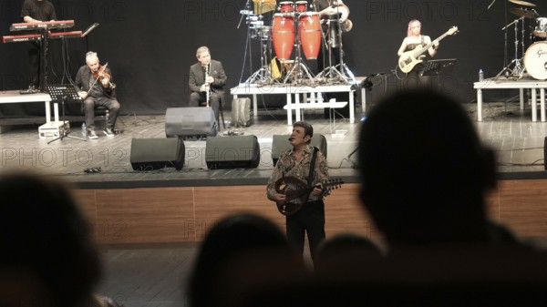 Turkish singer Coskun Sabah performs on stage at Gaziantep University as part of the Türkiye Kültür Yolu Festival. The concert reflects the festival's aim to celebrate music and cultural heritage through live performances across the city, Gaziantep, Gaziantep, Türkiye