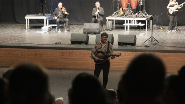 Turkish singer Coskun Sabah performs on stage at Gaziantep University as part of the Türkiye Kültür Yolu Festival. The concert reflects the festival's aim to celebrate music and cultural heritage through live performances across the city, Gaziantep, Gaziantep, Türkiye