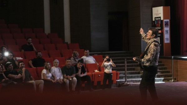 Turkish singer Coskun Sabah performs on stage at Gaziantep University as part of the Türkiye Kültür Yolu Festival. The concert reflects the festival's aim to celebrate music and cultural heritage through live performances across the city, Gaziantep, Gaziantep, Türkiye