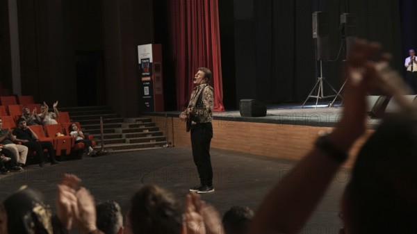 Turkish singer Coskun Sabah performs on stage at Gaziantep University as part of the Türkiye Kültür Yolu Festival. The concert reflects the festival's aim to celebrate music and cultural heritage through live performances across the city, Gaziantep, Gaziantep, Türkiye