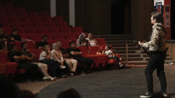 Turkish singer Coskun Sabah performs on stage at Gaziantep University as part of the Türkiye Kültür Yolu Festival. The concert reflects the festival's aim to celebrate music and cultural heritage through live performances across the city, Gaziantep, Gaziantep, Türkiye