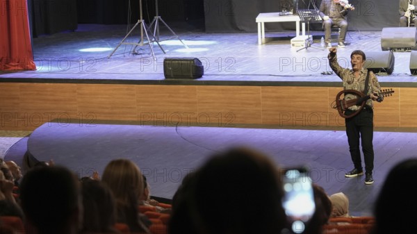 Turkish singer Coskun Sabah performs on stage at Gaziantep University as part of the Türkiye Kültür Yolu Festival. The concert reflects the festival's aim to celebrate music and cultural heritage through live performances across the city, Gaziantep, Gaziantep, Türkiye