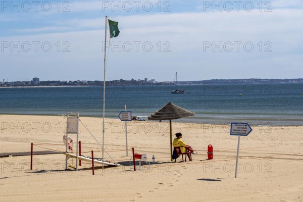 The Praia de São Roque beach, east of Lagos town centre, quite empty, lifeguards on duty, off-season, in the west of the Algarve, Portugal