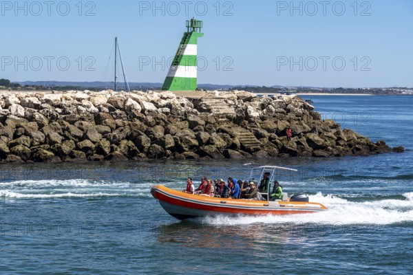 Motorboat tours to the rocky coast of Ponta da Piedade, the rugged coastal landscape, from Lagos, in the west of the Algarve, Portugal
