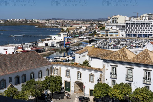 View over the roofs of the Paço Episcopal de Faro, the historic residence of the Bishop of the Algarve, from Faro to the harbour, Algarve, Portugal