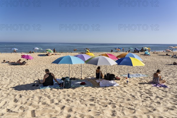 Kilometre-long sandy beach Praia do Barril, on the island off Santa Luzia, Algarve, Portugal