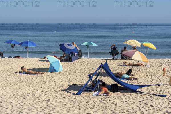 Kilometre-long sandy beach Praia do Barril, on the island off Santa Luzia, Algarve, Portugal
