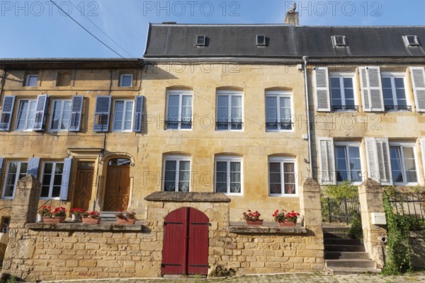 Renovated house facade, historic building, yellow sandstone, Marville, Renaissance village, Département Meuse, Grand Est, France