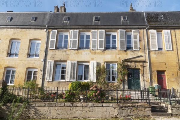 Renovated house facade, historic building, yellow sandstone, Marville, Renaissance village, Département Meuse, Grand Est, France