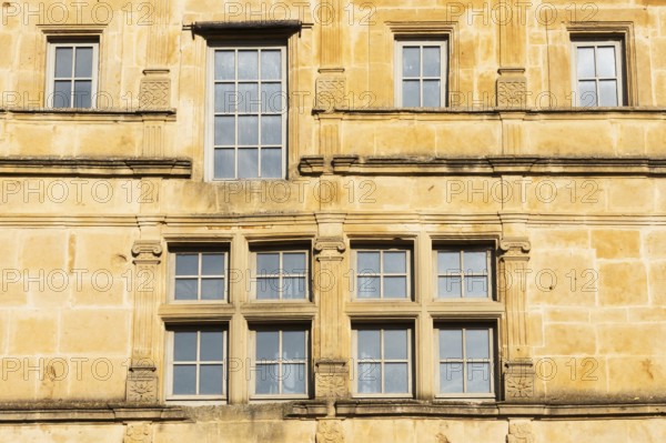 Window, historic house facade, yellow sandstone, Marville, Renaissance village, Département Meuse, Grand Est, France