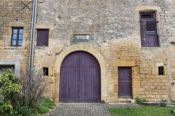 Historic house façade, yellow sandstone, Marville, Renaissance village, Département Meuse, Grand Est, France