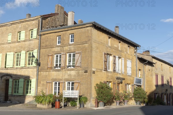Street corner, historic building, yellow sandstone, Marville, Renaissance village, Département Meuse, Grand Est, France