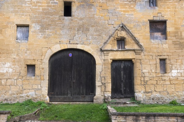 Historic house façade, yellow sandstone, Marville, Renaissance village, Département Meuse, Grand Est, France