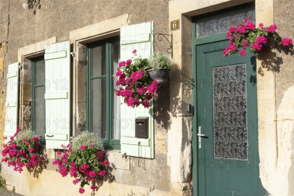 Entrance decorated with flowers, Marville, Renaissance village, Département Meuse, Grand Est, France