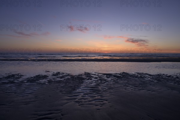 Sunset on the beach of the North Sea, Texel, North Holland, Netherlands