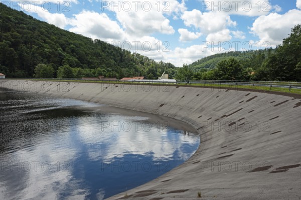 Reservoir of the river Oder below the Oder reservoir with reflection of the sky with clouds, dam for the extraction of electricity, Bad Lauterberg, Lower Saxony, Germany, Harz Mountains