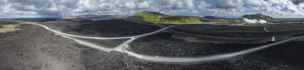 Lava, lava field, road, destroyed, summer, cloudy, sunny, panorama, aerial view Blue Lagoon, Sundhnúkur crater series, Fagradalsfjall, Reykjanes, Iceland