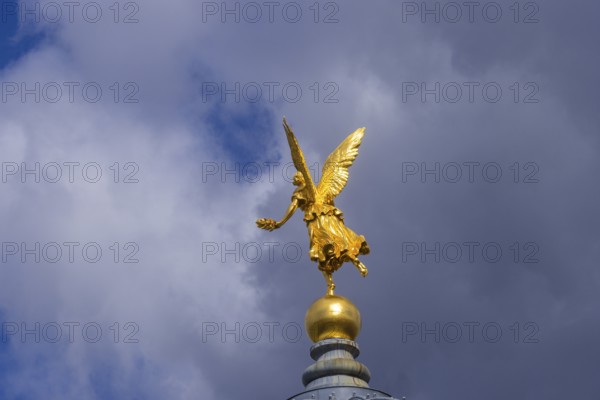 Fama (the goddess of rumours) on the dome of the Academy of Fine Arts, Dresden, Saxony, Germany