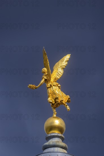 Fama (the goddess of rumours) on the dome of the Academy of Fine Arts, Dresden, Saxony, Germany