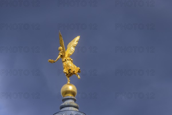 Fama (the goddess of rumours) on the dome of the Academy of Fine Arts, Dresden, Saxony, Germany