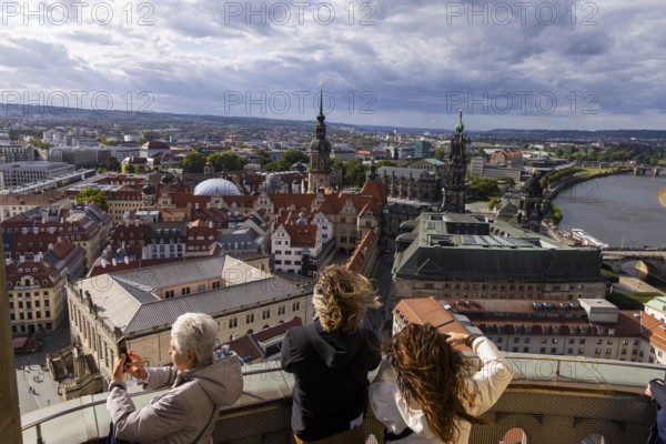 Tourists enjoying the view from the lantern of the Church of Our Lady, Dresden, Saxony, Germany