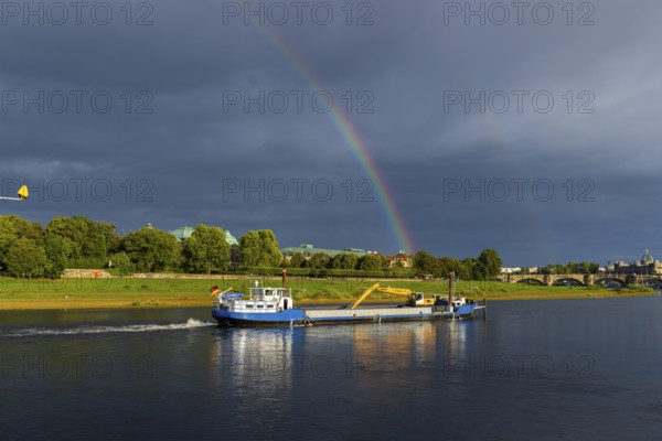Dredger Domarin with rainbow over the Elbe at Neustädter Elbufer, Dresden, Saxony, Germany