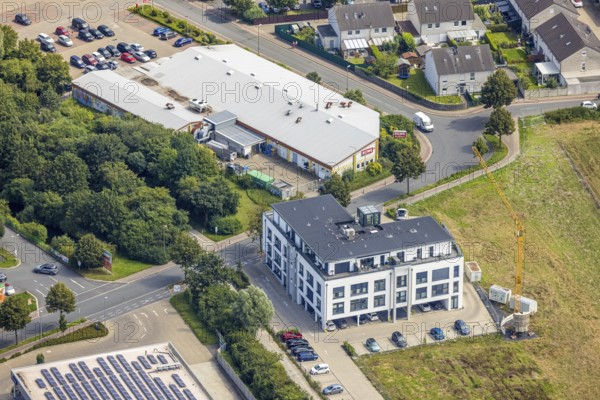 Aerial view, Rewe supermarket in Bergkamen, Ruhr area, North Rhine-Westphalia, Germany, Bergkamen, DE, shopping markets, shopping centre, Europe, aerial view, aerial photography, aerial photography, local supply centre, supermarket, overview, bird's-eye view, overview