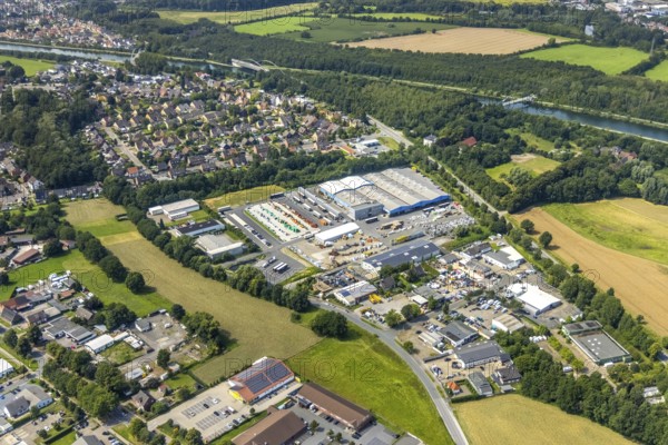 Aerial view, Eurobaustoff Zentrallager Westfalen GmbH in Rünthe, Bergkamen, Ruhr area, North Rhine-Westphalia, Germany, DE, Europe, commercial enterprises, commercial area, commercial park, commercial location, commercial use, industrial area, industrial building, industrial location, aerial photograph, aerial photography, aerial photography, overview, bird's-eye view, bird's-eye view, overview