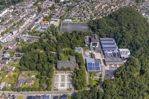 Aerial view, sports field at Schacht III and housing estate Zechenweg in Rünthe, Bergkamen, Ruhr area, North Rhine-Westphalia, Germany, DE, Europe, commercial enterprises, commercial area, commercial park, commercial location, commercial use, industrial area, industrial building, industrial location, aerial photograph, aerial photography, aerial photography, sports facilities, sports field, sports facility, overview, bird's-eye view, overview