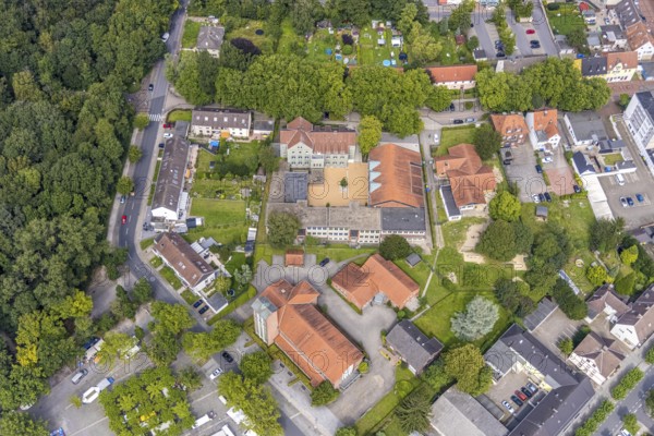 Aerial view, St. Elisabeth Catholic Church and Pestalozzi School and Catholic Kindergarten in Bergkamen, Ruhr area, North Rhine-Westphalia, Germany, place of worship, Bergkamen, education, educational institution, DE, Europe, religious community, place of worship, holy place, kindergarten, day care centre, day care centre, church, parish, day care centre, denomination, educational institute, aerial view, aerial photography, aerial photography, religion, religious site, school, overview, bird's-eye view, overview