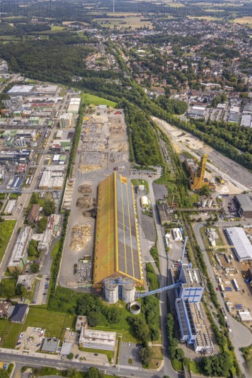 Aerial view, industrial estate Neu-Monopol with Umweltkontor Bergkamen in Bergkamen, Ruhr area, North Rhine-Westphalia, Germany, Bergkamen, DE, Europe, commercial enterprises, commercial area, industrial estate, business park, commercial site, commercial use, timber yard, industrial estate, industrial building, industrial site, aerial photograph, aerial photography, aerial photography, recycling centre, overview, bird's-eye view, birds-eyes view, overview